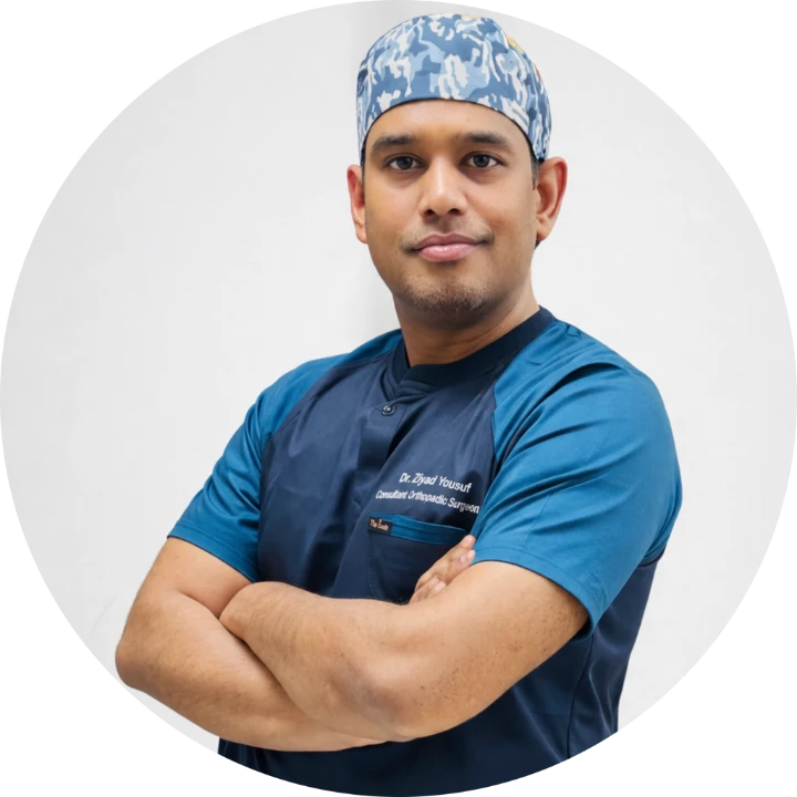 Professional profile portrait of Dr Manoj Sonkar, experienced GI, laparoscopic and hernia surgeon in Kanpur, wearing surgical scrubs and demonstrating expertise in minimally invasive gastrointestinal surgery.